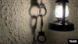 Handcuffs and a lantern