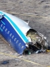 A drone view shows the crash site of a passenger plane near Aktau