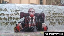 Граффити Путина, на котором написано "Убийца и вор" (7 октября)