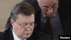 Viktor Yanukovych və Mykola Azarov 